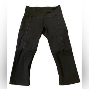 Lululemon women’s black leggings with mesh cutout sides size 4